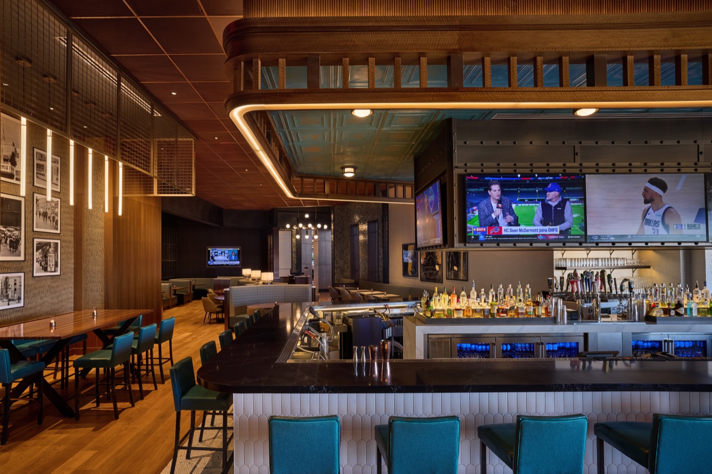 Pub Stop bar at White Tanks with sports screens and teal seating